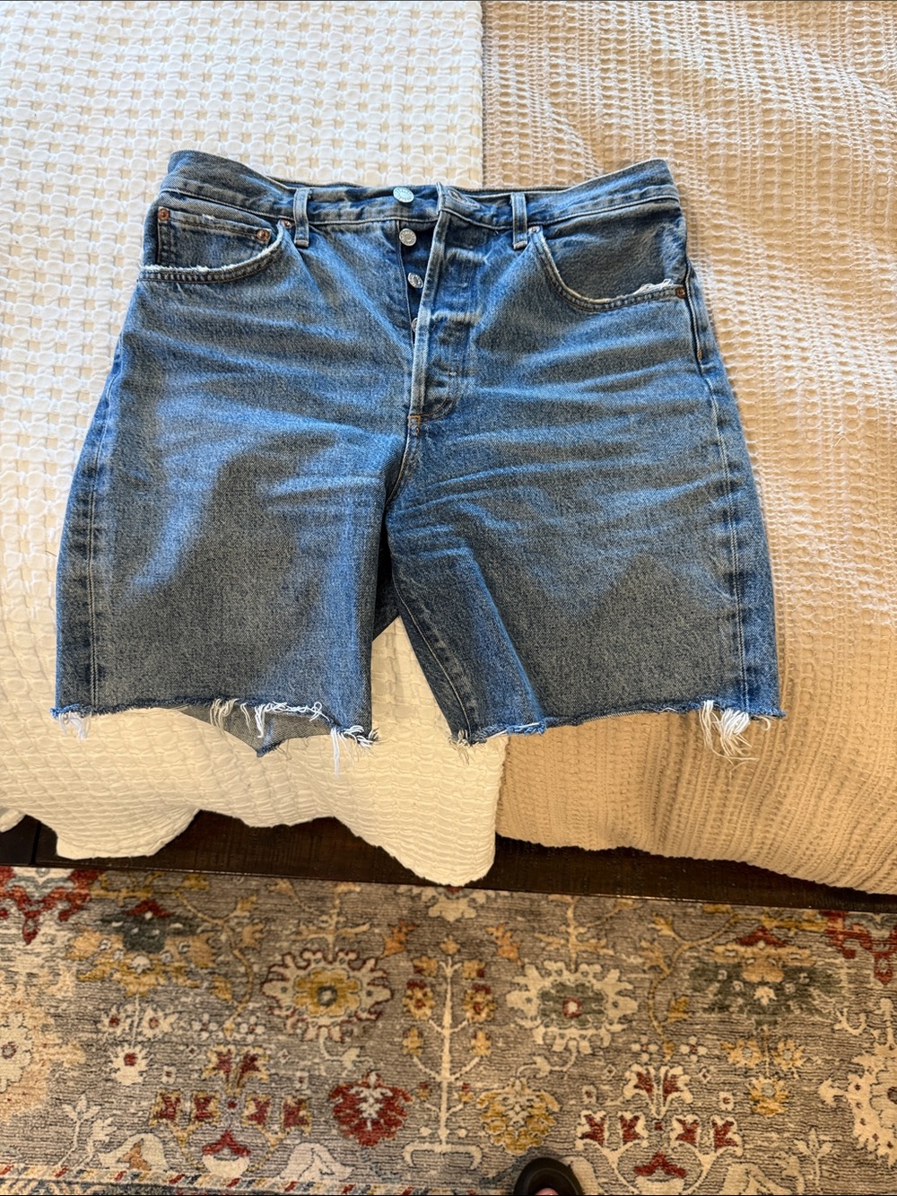 Agolde Mid-Blue Cutoff Denim Shorts with Frayed Hem